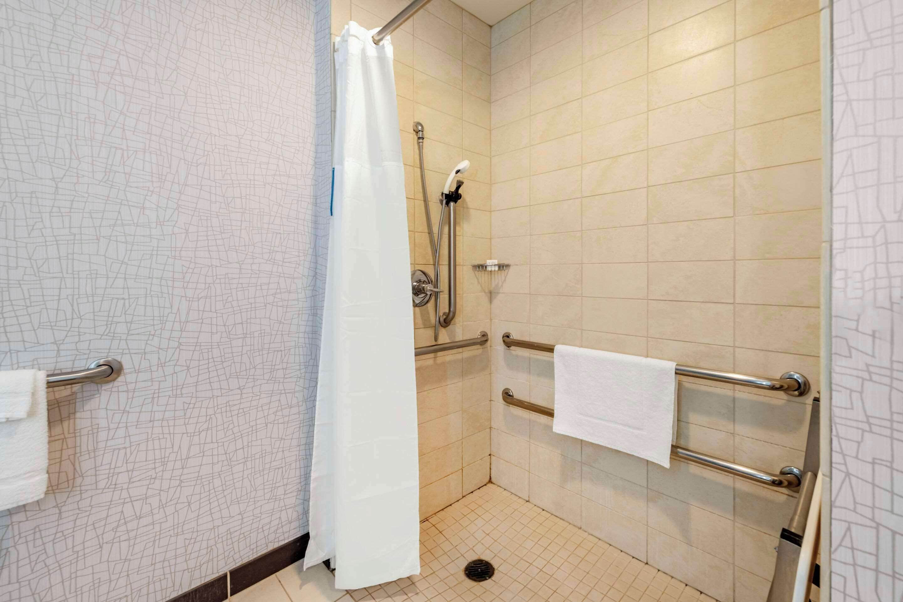 premium bedding, desk, laptop workspace, blackout curtains