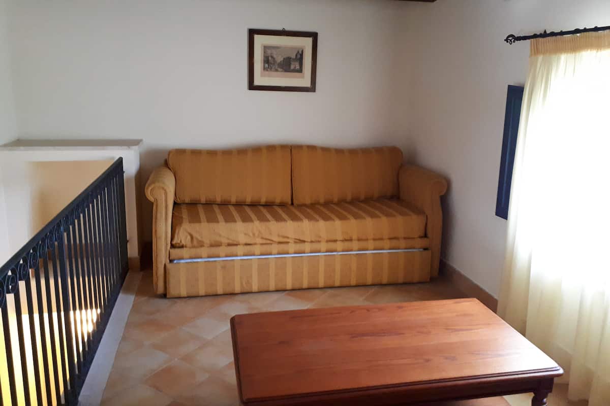 Junior Suite, 2 Bedrooms | Living area
