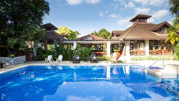 Outdoor pool, pool umbrellas, pool loungers
