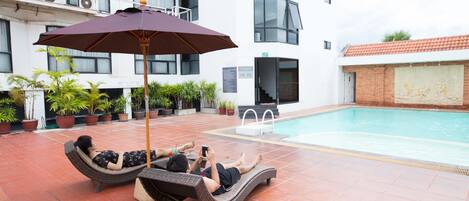 Outdoor pool, sun loungers