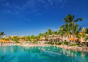 6 outdoor pools, open 6 AM to 7 PM, free cabanas, pool umbrellas