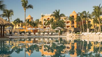 6 outdoor pools, open 6 AM to 7 PM, free cabanas, pool umbrellas