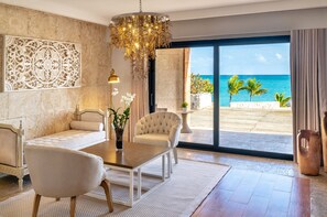 Suite Imperial | Living area | 55-inch flat-screen TV with cable channels, TV