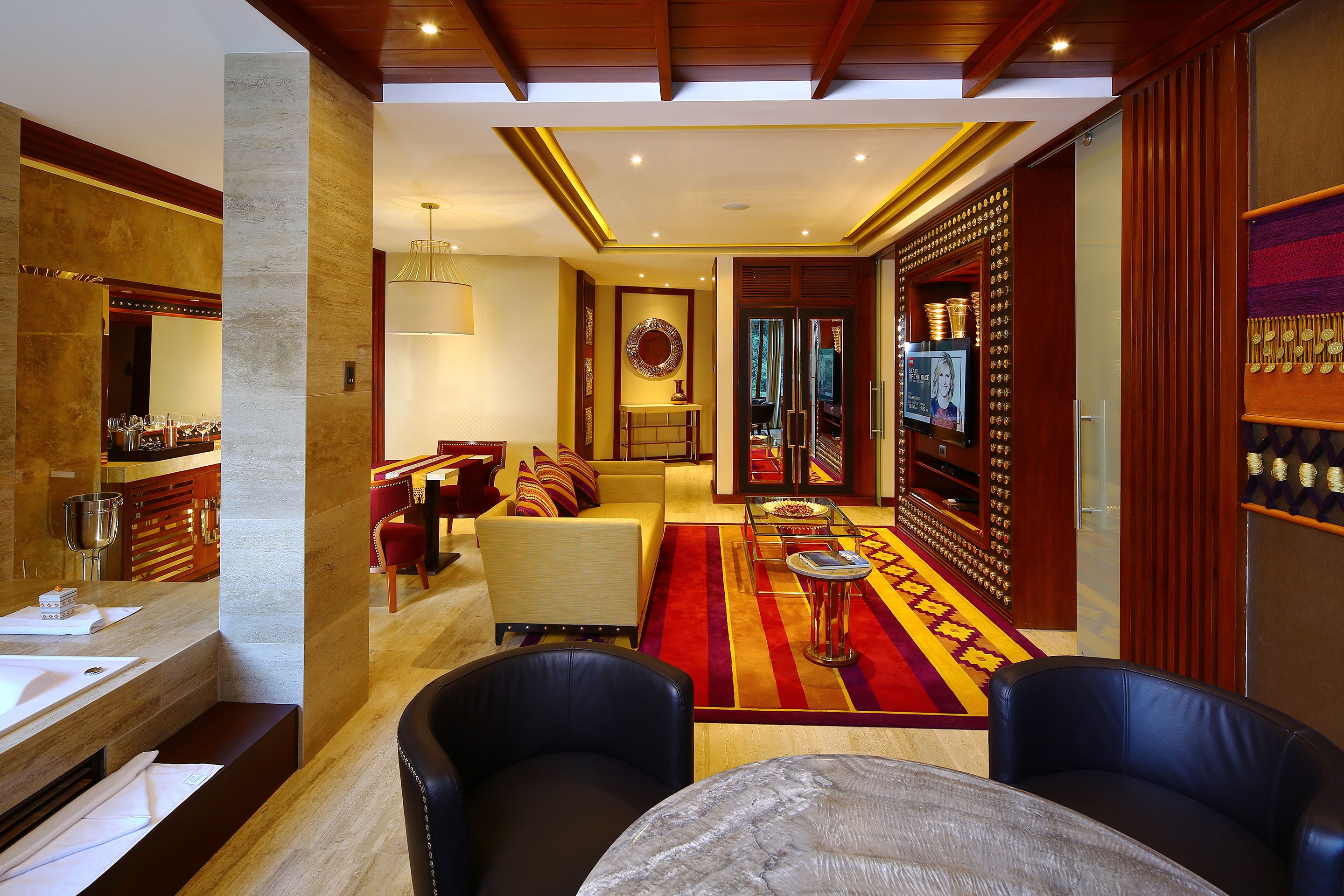 premium suite, 1 king bed, river view | living room | 32-inch lcd tv with cable channels, tv, ipod dock