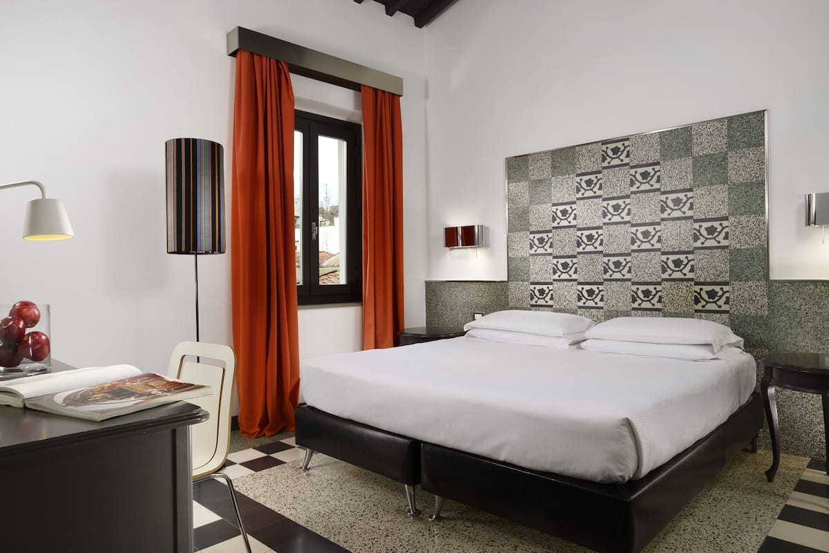 Deluxe kamer | Een minibar, individueel gedecoreerd, individueel gemeubileerd