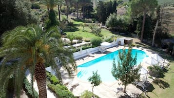 Seasonal outdoor pool, pool umbrellas, sun loungers