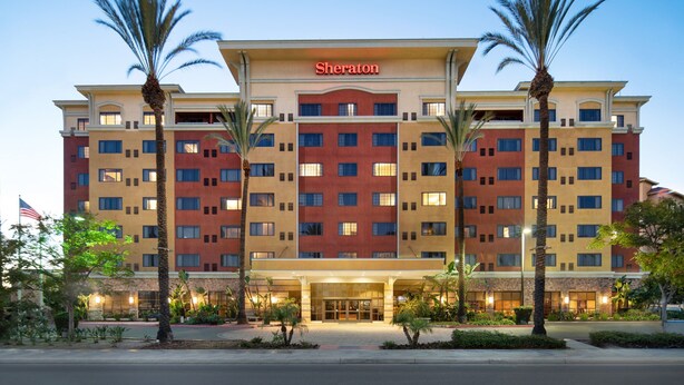 A Sheraton hotel with a symmetrical facade, multiple floors, and a central entrance. - Sheraton Garden Grove-Anaheim South Hotel (Garden Grove)