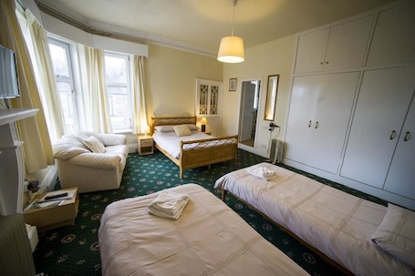 Family Room | Iron/ironing board, bed sheets