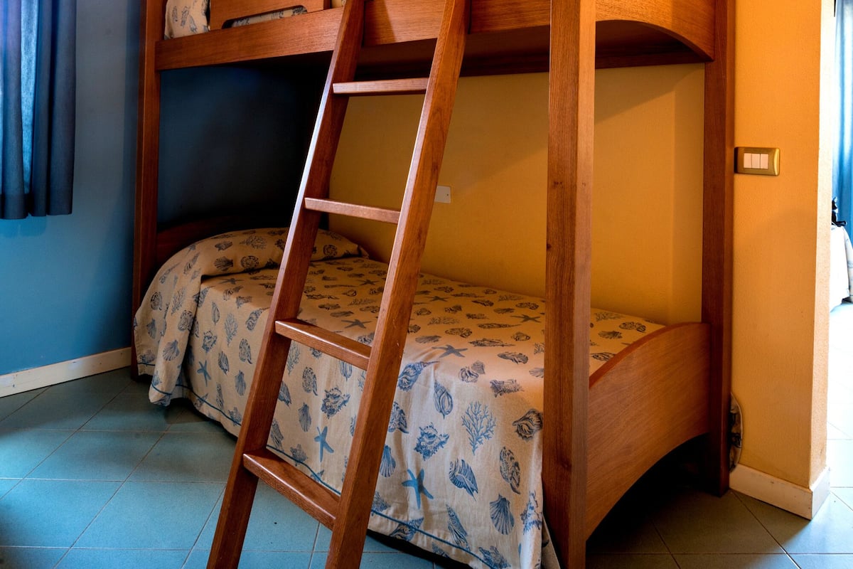 Family Quadruple Room | 1 bedroom, premium bedding, minibar, in-room safe
