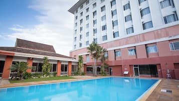 Outdoor pool, open 6:30 AM to 6:30 PM, pool umbrellas, pool loungers