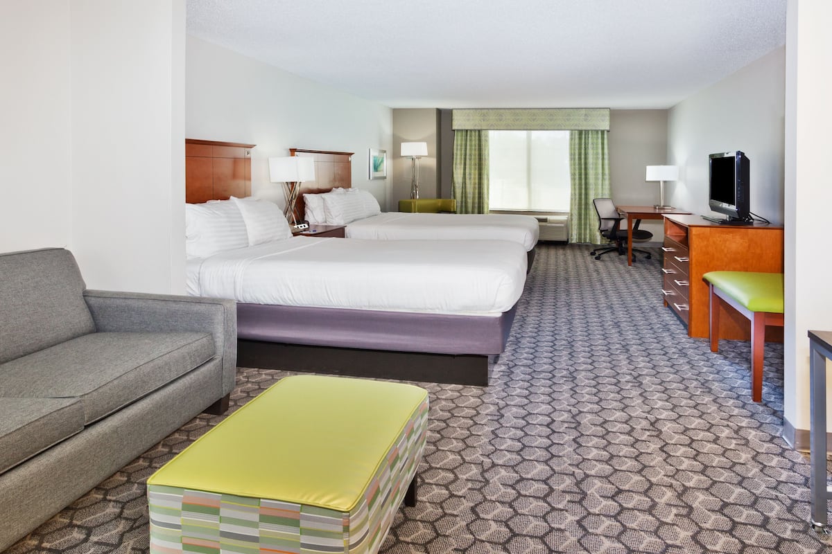 Suite, Multiple Beds (Additional Living Area) | Desk, laptop workspace, blackout drapes, iron/ironing board