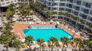 A rooftop pool area with multiple levels of balconies, palm trees, and sun loungers. - Servatur Don Miguel - Adults Only (San Bartolomé de Tirajana)