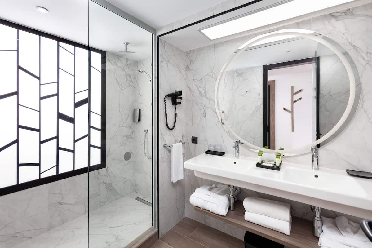 double room, balcony (small,seaside orientation) | bathroom | shower, eco-friendly toiletries, hair dryer, bathrobes