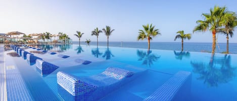 6 outdoor pools, pool umbrellas, pool loungers