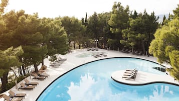 Indoor pool, outdoor pool, pool umbrellas, sun loungers