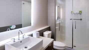 Designer toiletries, hair dryer, towels
