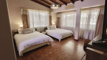 Family Quadruple Room, 2 Queen Beds, Private Bathroom | In-room safe, soundproofing, iron/ironing board, cribs/infant beds