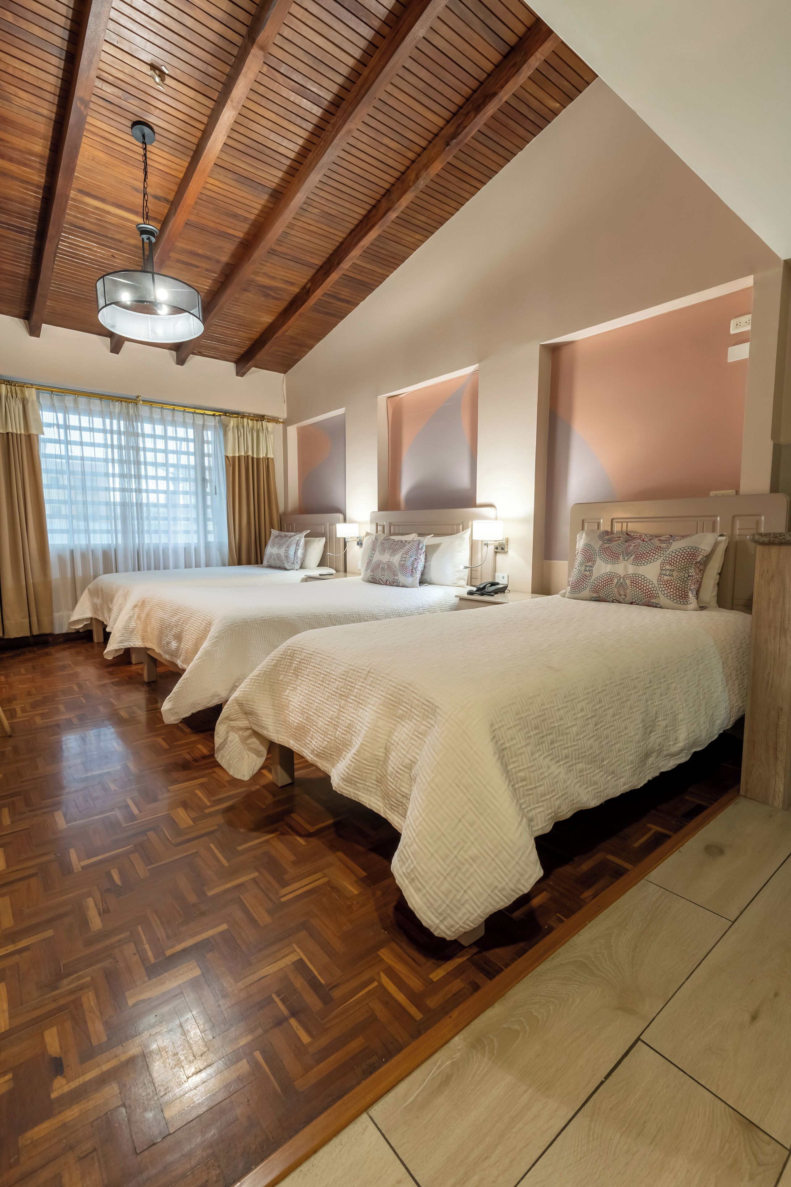 superior suite, 1 bedroom, city view | in-room safe, soundproofing, iron/ironing board, cots/infant beds