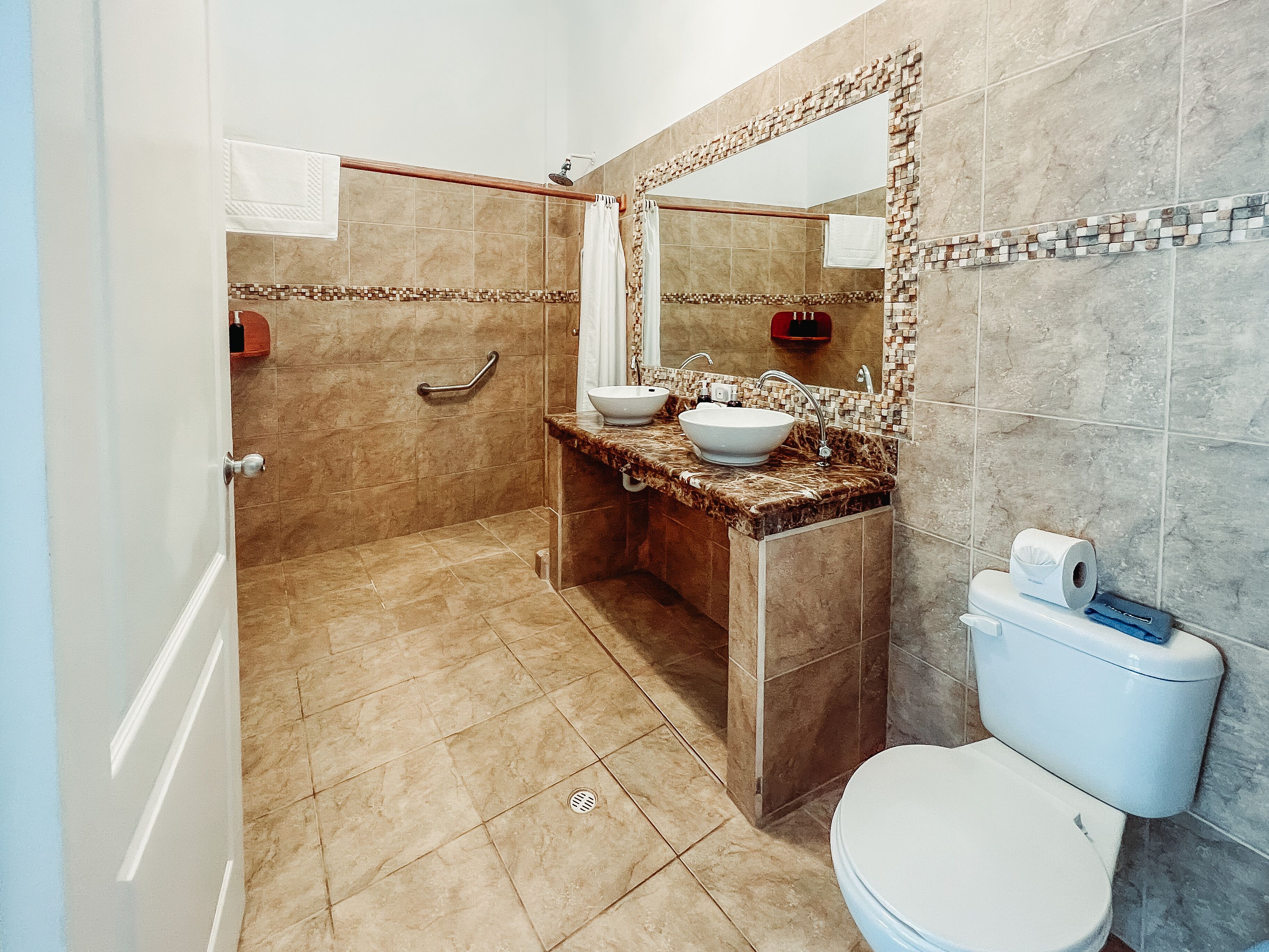 shower, rainfall showerhead, eco-friendly toiletries, hair dryer