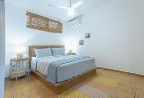 In-room safe, desk, laptop workspace, free WiFi - SLABDR Coliving | Once Surf Salvación. (Cabarete)