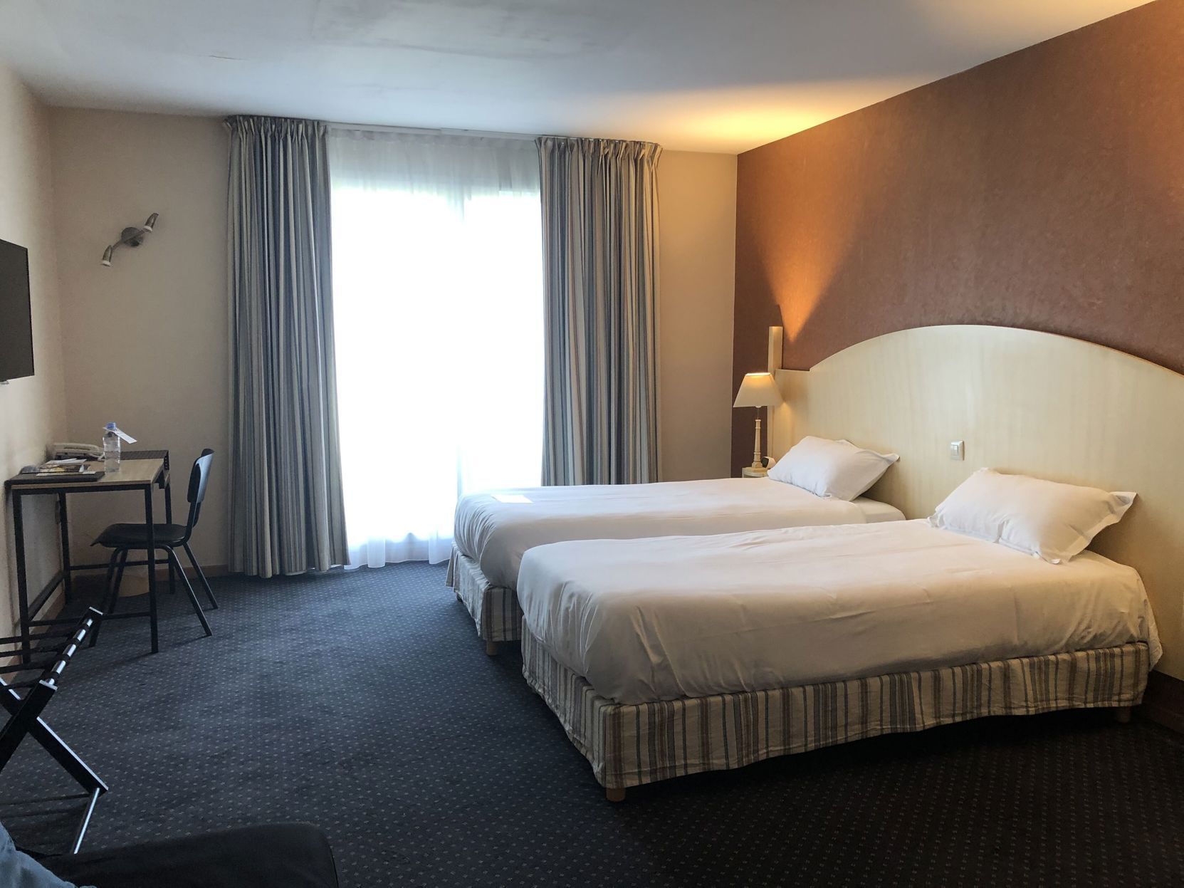 Premium bedding, minibar, desk, soundproofing