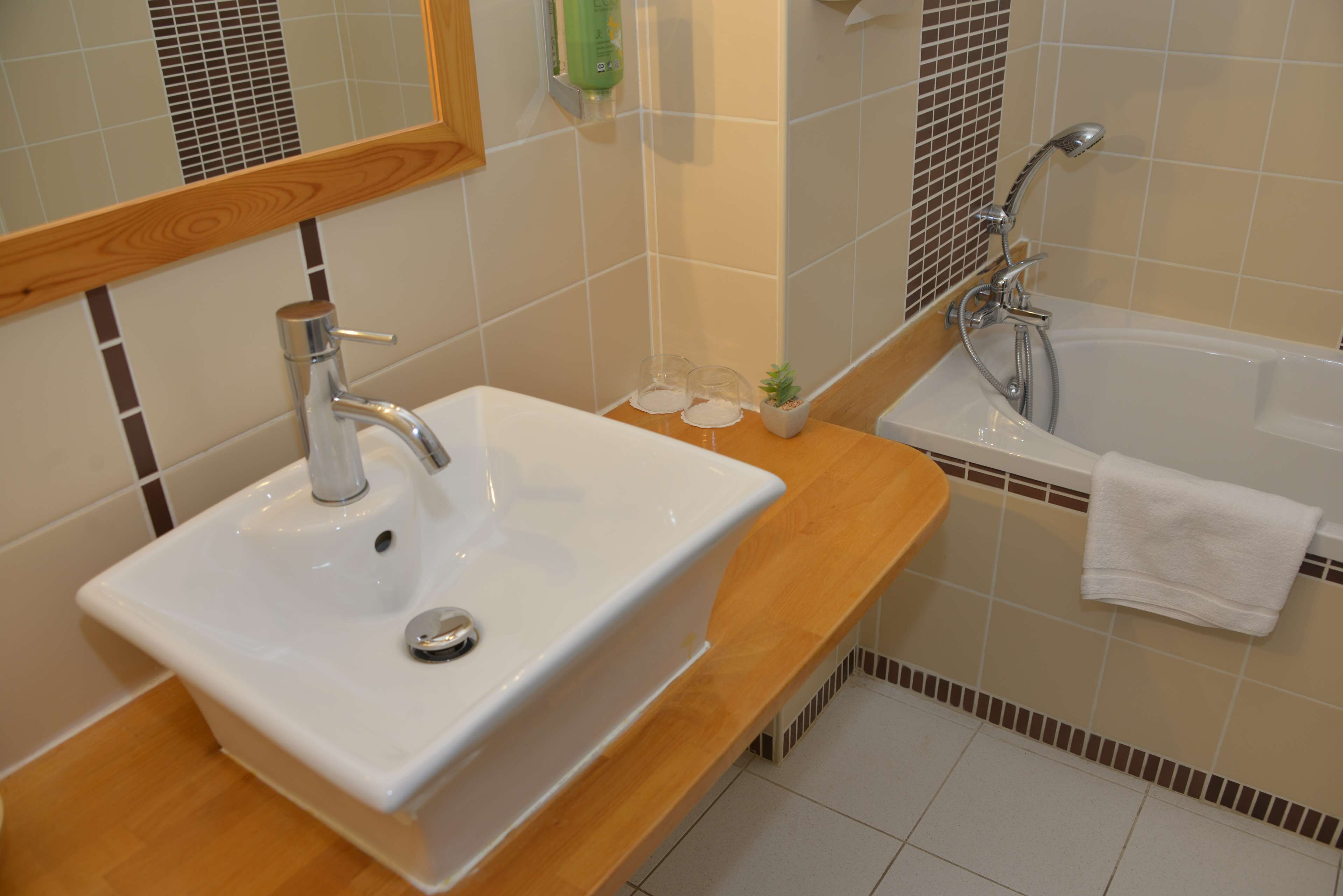 family room, multiple beds, non smoking (with single sofabed) | bathroom | separate bathtub and shower, free toiletries, hair dryer, towels