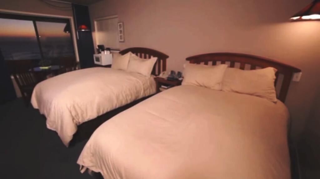 premium bedding, blackout curtains, iron/ironing board, bed sheets