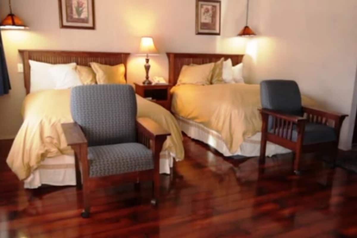 premium bedding, blackout curtains, iron/ironing board, bed sheets