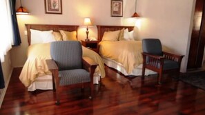 Premium bedding, blackout curtains, iron/ironing board, bed sheets