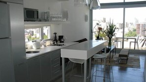 Loft | Private kitchen | Full-sized fridge, microwave, coffee/tea maker, cookware/dishes/utensils - Hollywood Suites & Lofts (Buenos Aires)
