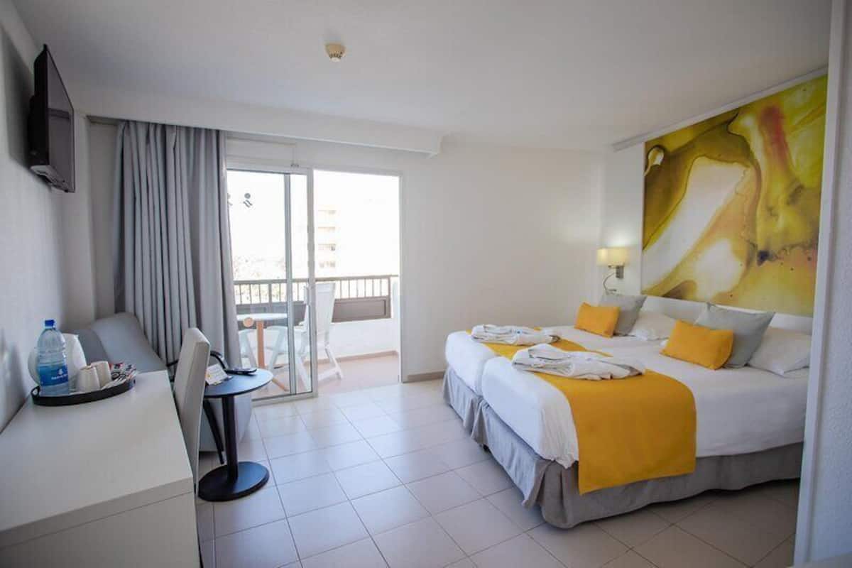 Down duvets, pillow-top beds, in-room safe, desk