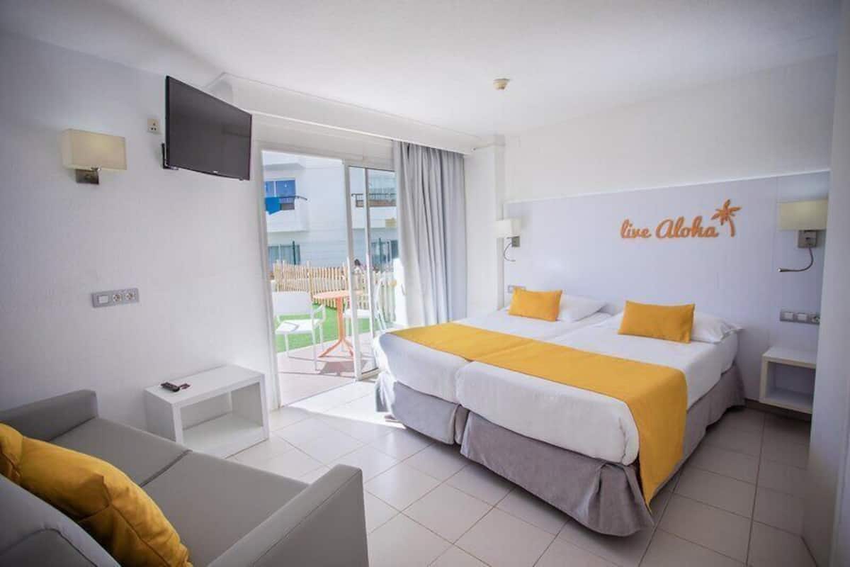 Down duvets, pillow-top beds, in-room safe, desk