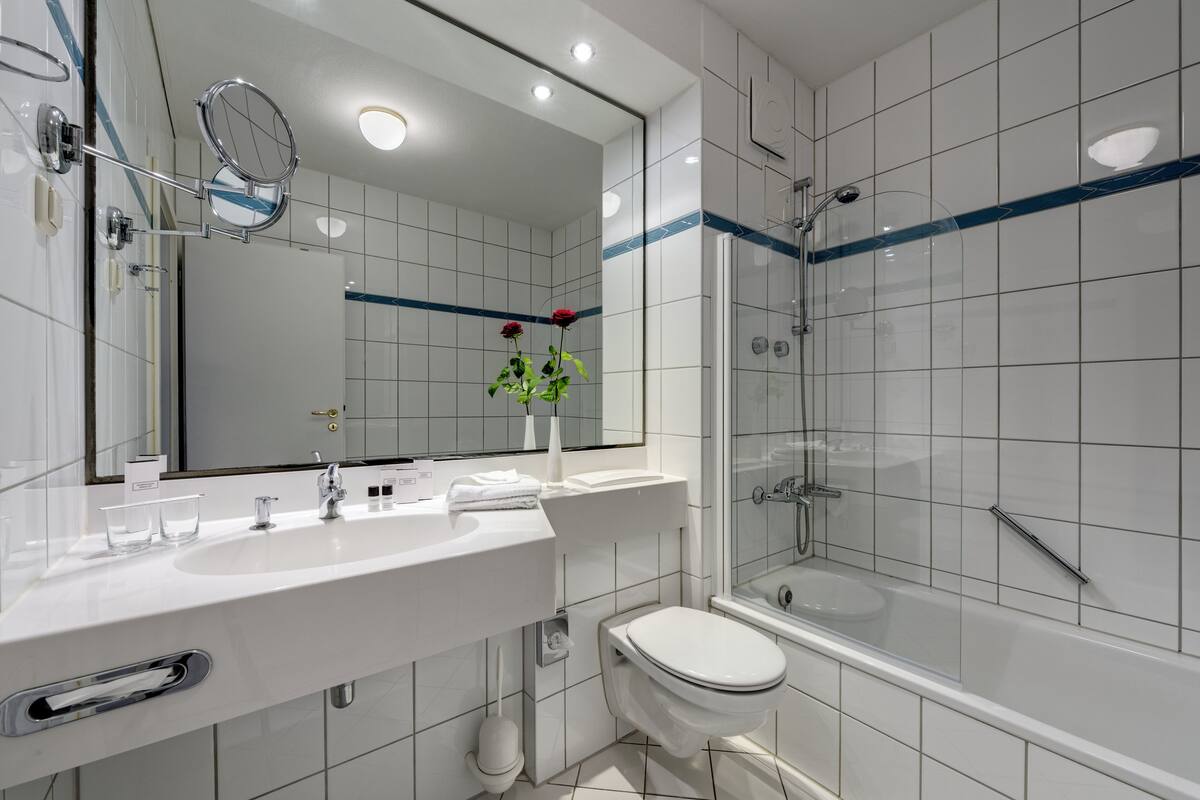 hair dryer, towels, soap, shampoo