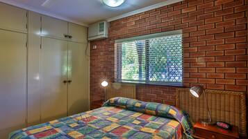 Economy Apartment, 1 Bedroom | Iron/ironing board, cribs (surcharge), WiFi (free)