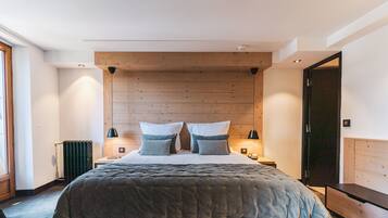 Suíte família | Roupas de cama premium, cofres nos quartos, escrivaninha