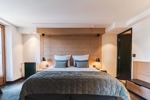 家庭套房 | 高档床上用品、客房内保险箱、办公桌、隔音