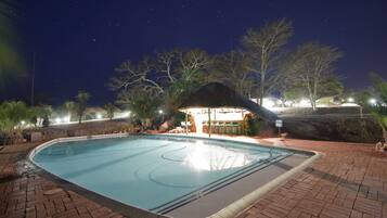 Outdoor pool, free pool cabanas, pool umbrellas