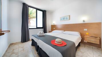 Apartment, 1 Bedroom | 1 bedroom, premium bedding, free cribs/infant beds, bed sheets