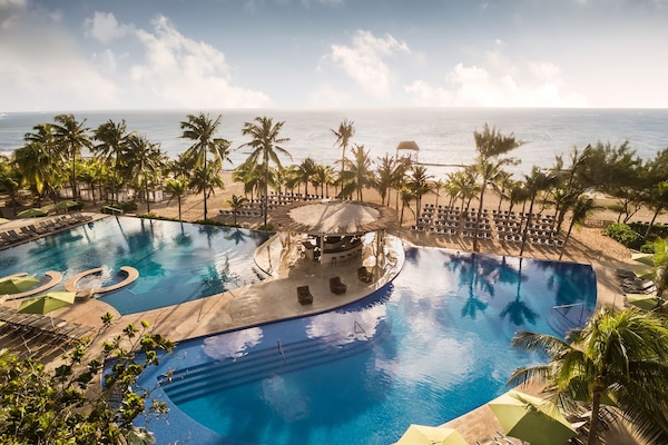 8 outdoor pools, pool umbrellas, sun loungers
