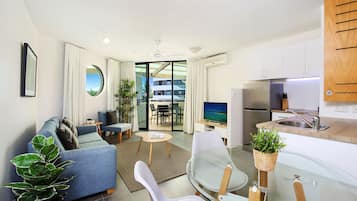 Rooftop One Bedroom Unit | Living area | 32-inch LCD TV with digital channels, TV