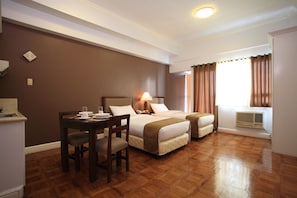 Estudio ejecutivo | Cortinas blackout, tabla de planchar con plancha y camas extra