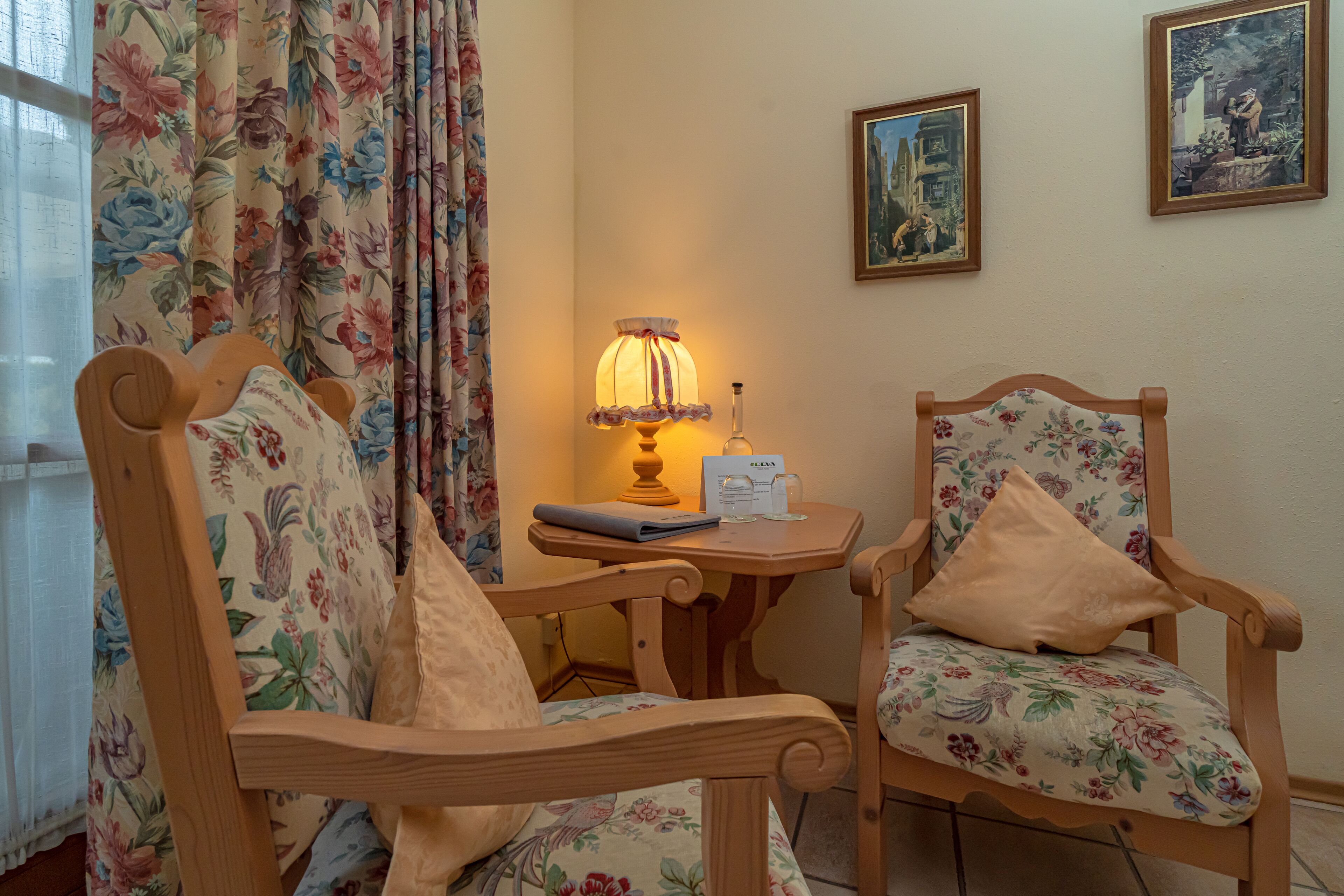 superior double room | living area | flat-screen tv