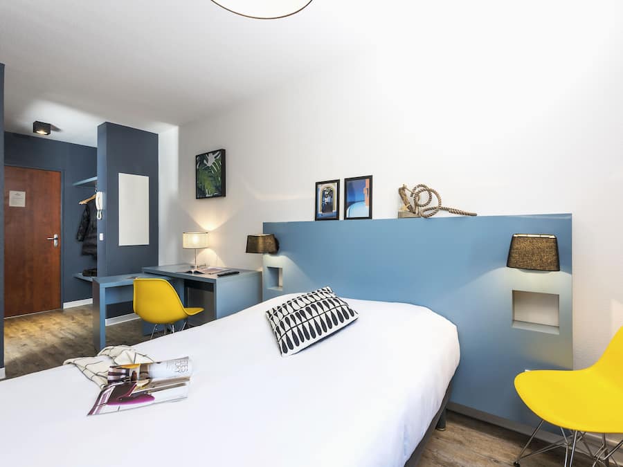 Desk, laptop workspace, blackout curtains, free WiFi