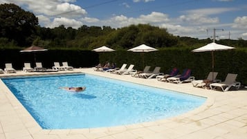 Seasonal outdoor pool, pool umbrellas, pool loungers