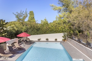 Seasonal outdoor pool, open 9 AM to 8 PM, pool umbrellas, sun loungers