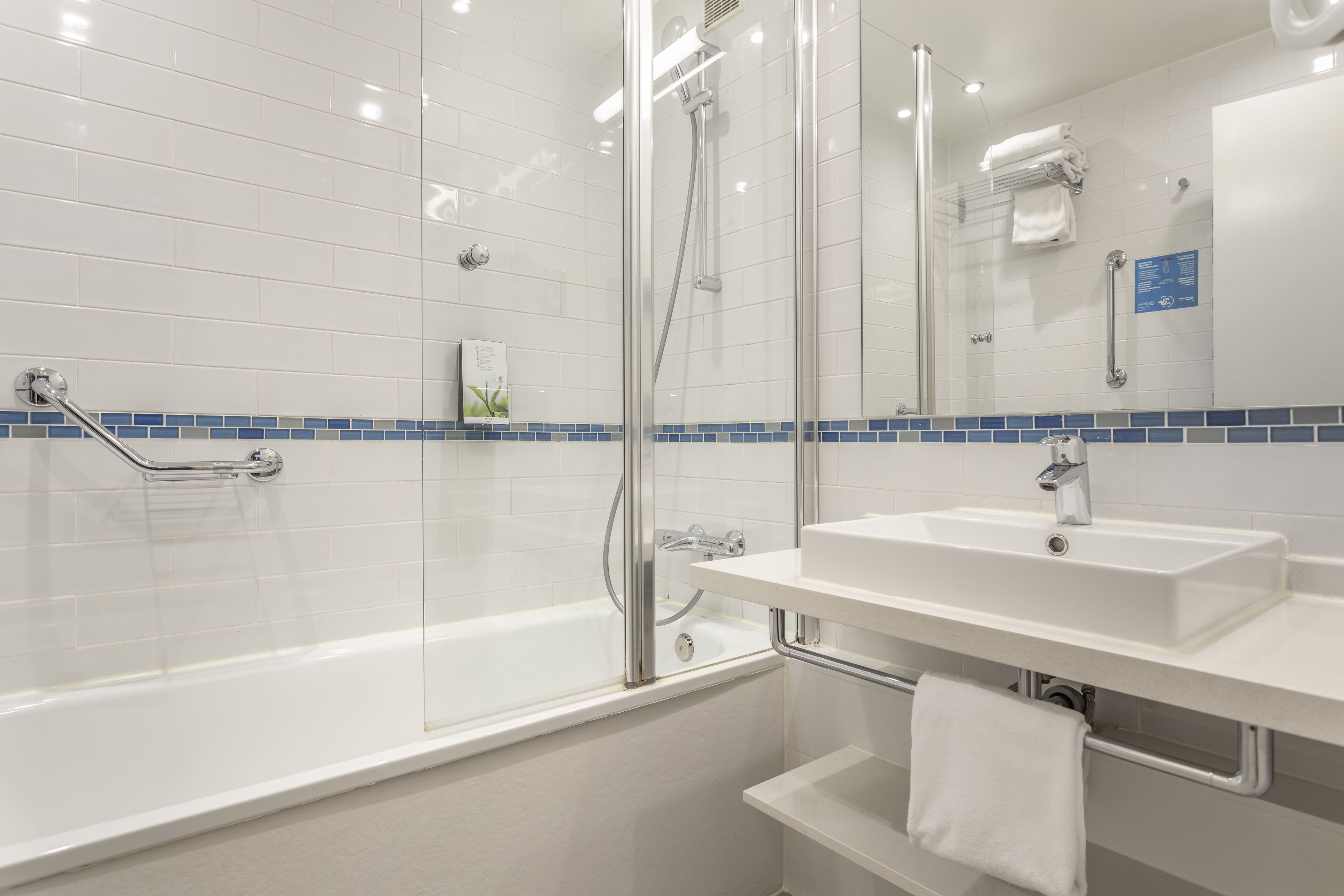 eco-friendly toiletries, hair dryer, towels