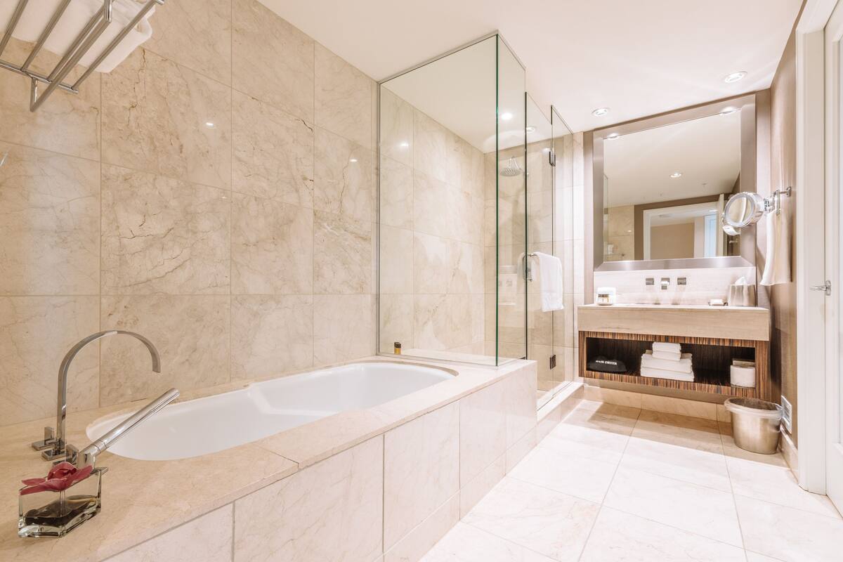 suite (boutique suite, 1 bedroom ) | bathroom | designer toiletries, hair dryer, bathrobes, slippers