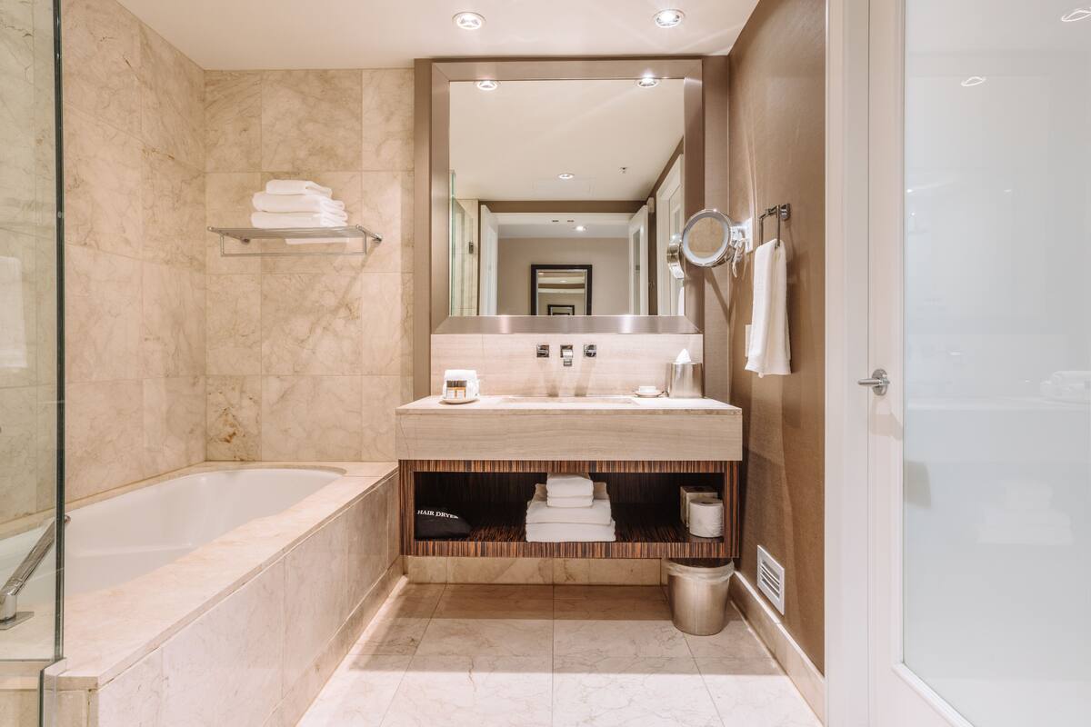 classic boutique room | bathroom | designer toiletries, hair dryer, bathrobes, slippers