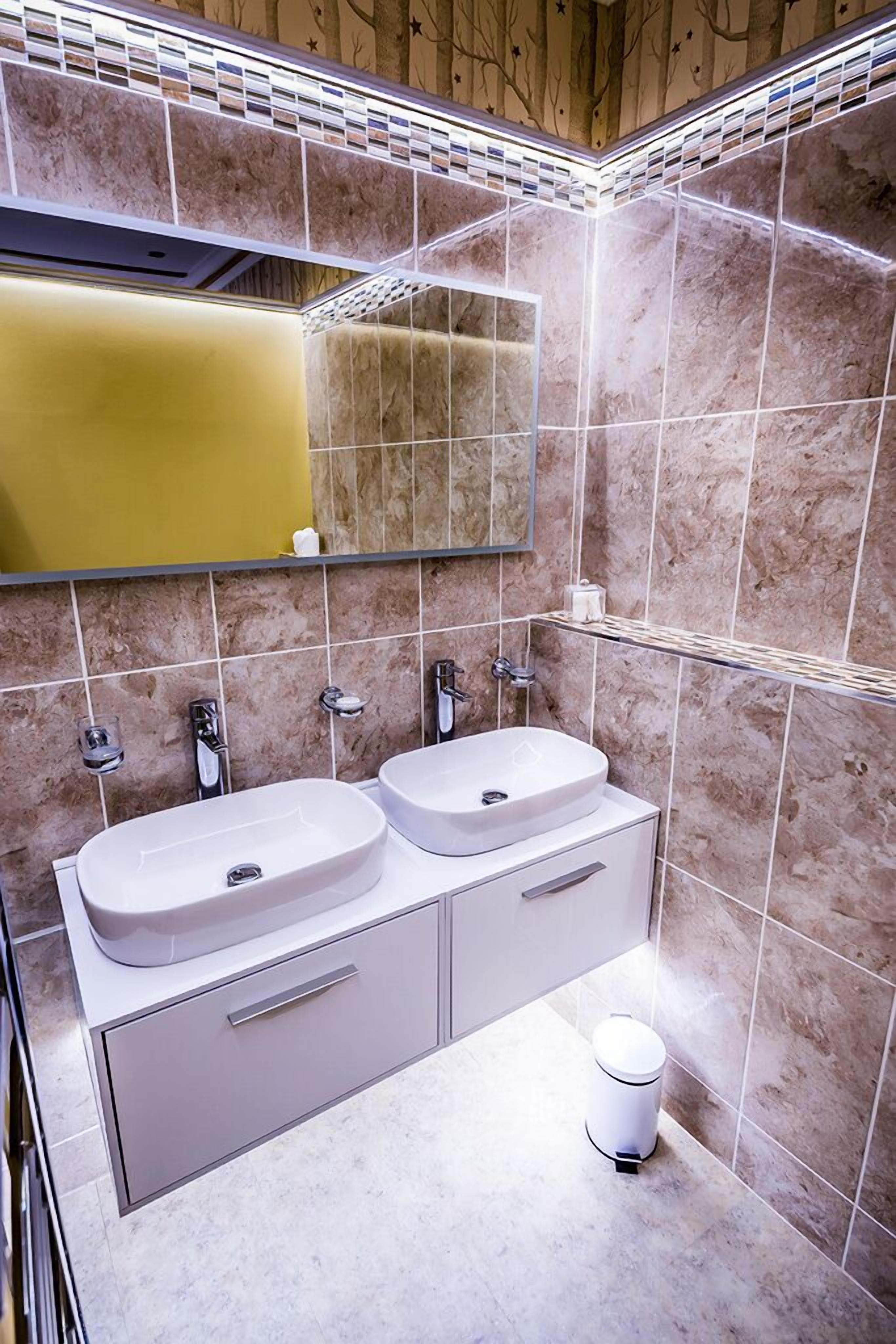 deluxe double room, 1 king bed | bathroom | shower, designer toiletries, towels