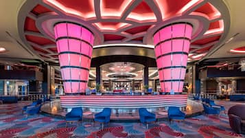 10 bars/lounges, poolside bar, beach bar